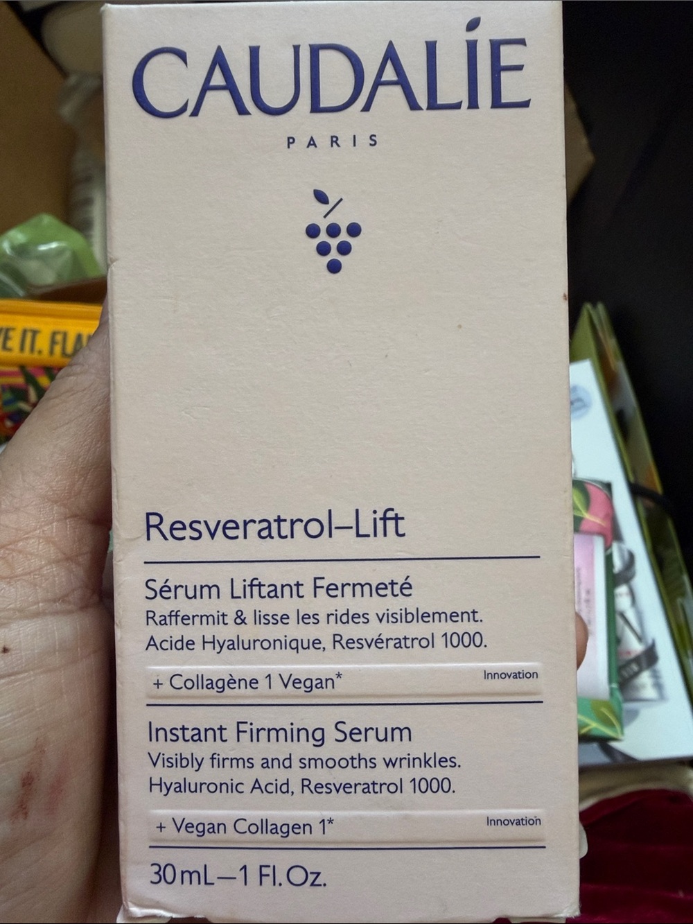 Caudalie Resveratrol-Lift Serum — Cream and Navy Blue Packaging